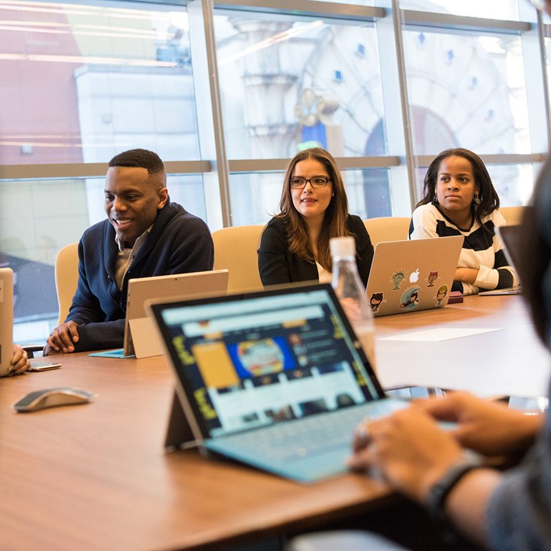 Group of people in a boardroom